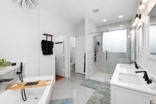 933 Oatlands Pl, Burleson, TX 76028 - bathroom featuring double vanity, toilet, a stall shower, a tub, and tile patterned flooring