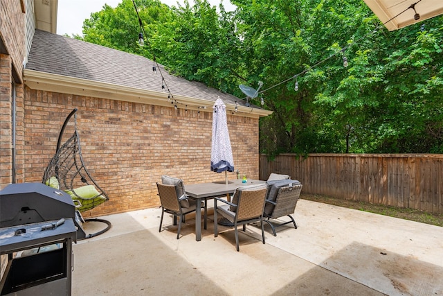 933 Oatlands Pl, Burleson, TX 76028 - fenced backyard with outdoor dining area, a patio area, and area for grilling