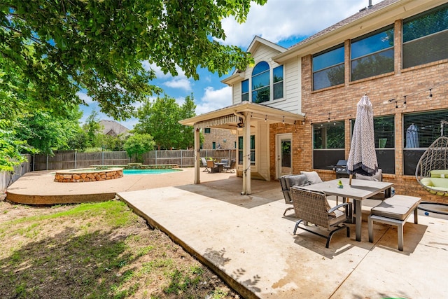 933 Oatlands Pl, Burleson, TX 76028 - fenced backyard with outdoor dining space, a ceiling fan, a patio area, and a pool with connected hot tub