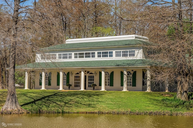 5705 Lake Side Dr, Bossier City, LA 71111 - rear view of property featuring a porch, a yard, and a water view