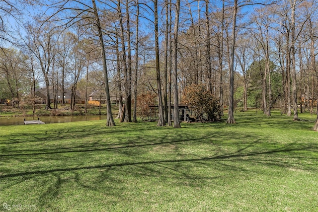 5705 Lake Side Dr, Bossier City, LA 71111 - view of green lawn with a water view