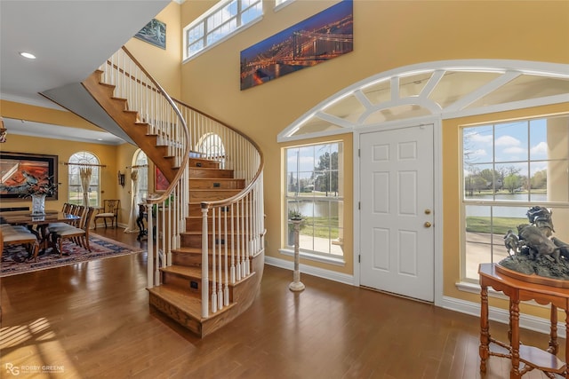 5705 Lake Side Dr, Bossier City, LA 71111 - foyer with hardwood / wood-style floors, stairs, and a water view