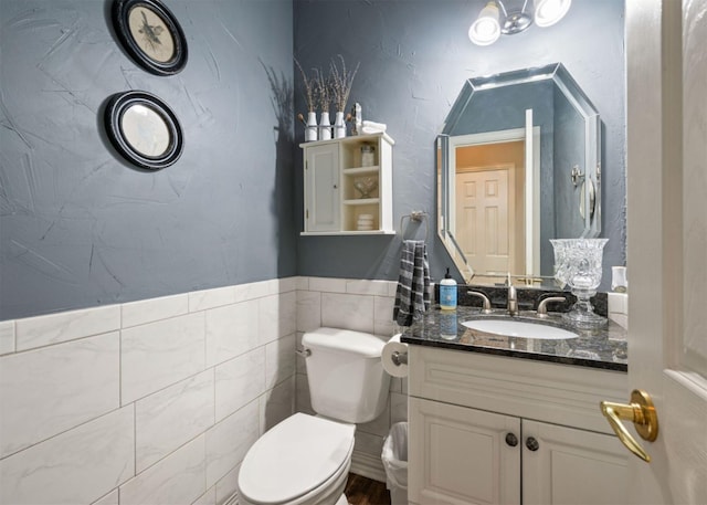 2541 Sir Tristram Ln, Lewisville, TX 75056 - half bathroom featuring vanity and tile walls