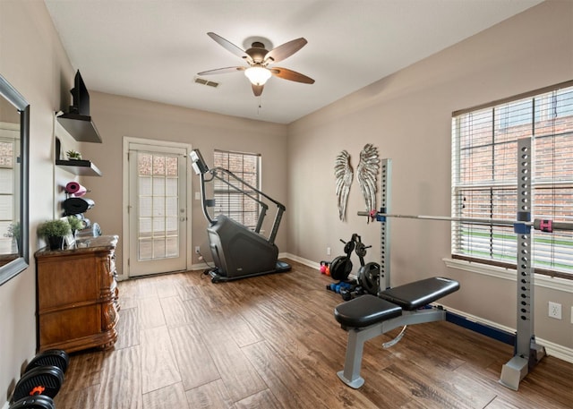 2541 Sir Tristram Ln, Lewisville, TX 75056 - exercise room featuring ceiling fan and wood finished floors