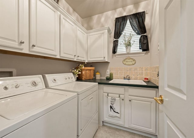 2541 Sir Tristram Ln, Lewisville, TX 75056 - laundry area featuring cabinet space, washer and dryer, and light tile patterned floors