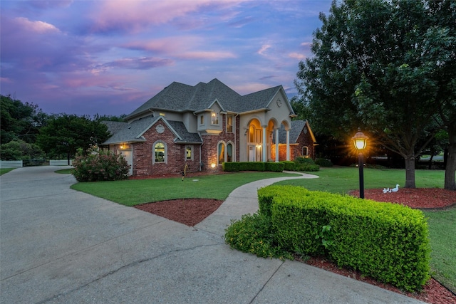 3873 Heritage Trl, Celina, TX 75009 - french provincial home with a yard, stucco siding, and concrete driveway