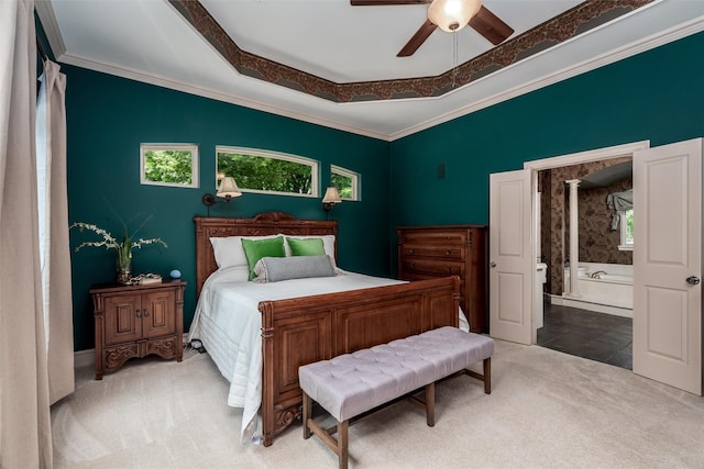 3873 Heritage Trl, Celina, TX 75009 - carpeted bedroom with ceiling fan, ornamental molding, and ensuite bath