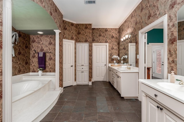 3873 Heritage Trl, Celina, TX 75009 - full bathroom featuring two vanities, wallpapered walls, a bath, crown molding, and ornate columns