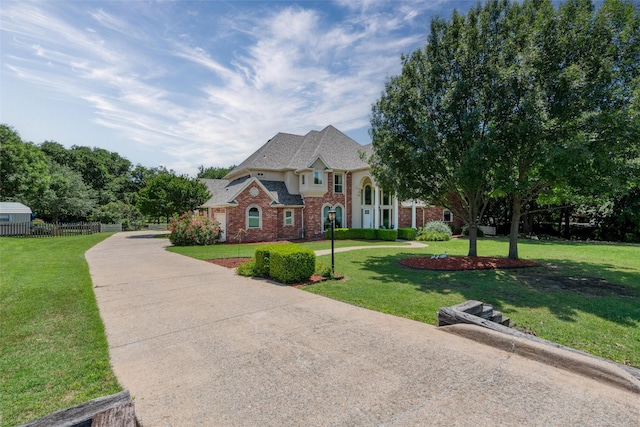 3873 Heritage Trl, Celina, TX 75009 - view of front of property with brick siding and driveway