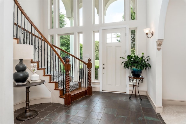 3873 Heritage Trl, Celina, TX 75009 - foyer with a towering ceiling, stairs, and baseboards
