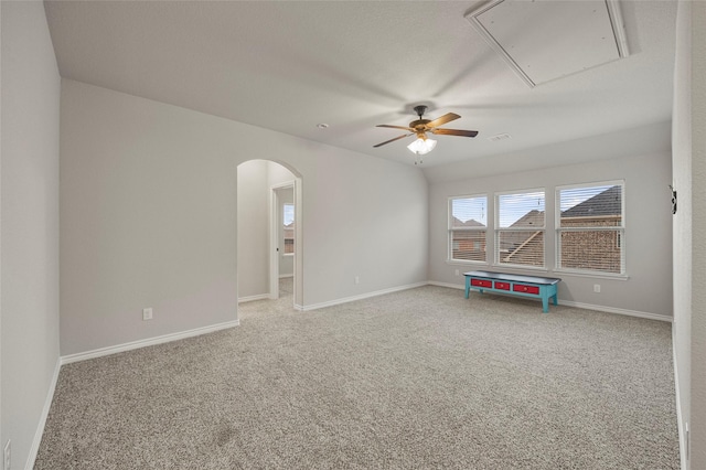 2408 Comal Ct, Royse City, TX 75189 - empty room featuring attic access, ceiling fan, light carpet, and arched walkways