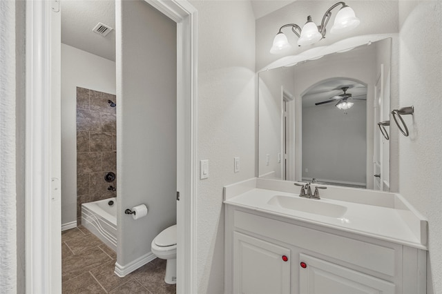 2408 Comal Ct, Royse City, TX 75189 - bathroom with a ceiling fan, toilet, vanity, shower / washtub combination, and tile patterned floors