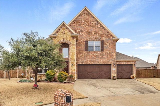 2408 Comal Ct, Royse City, TX 75189 - view of front facade with brick siding, concrete driveway, a shingled roof, and an attached garage