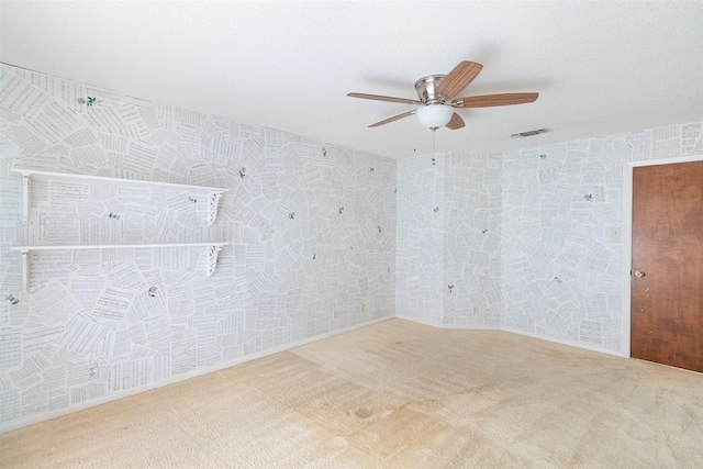 2992 County Road 100, Brady, TX 76825 - carpeted spare room with a ceiling fan
