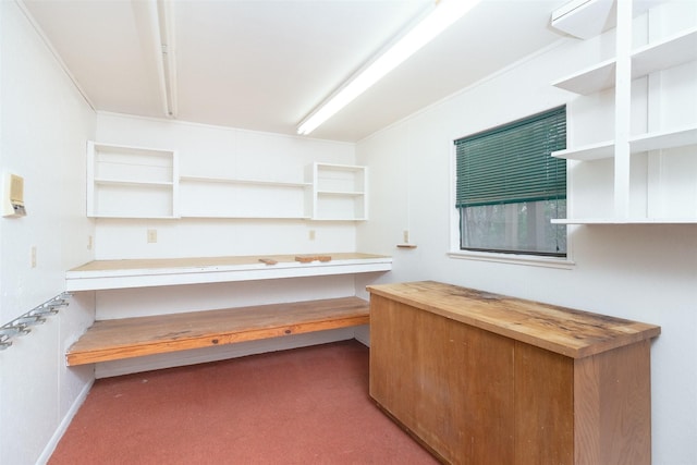 2992 County Road 100, Brady, TX 76825 - kitchen featuring open shelves, carpet floors, and butcher block counters