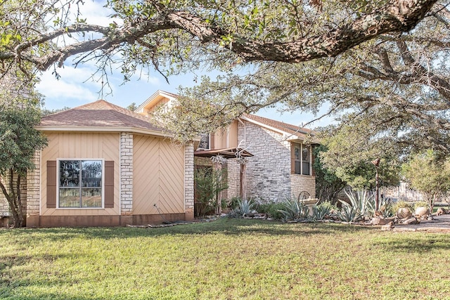 2992 County Road 100, Brady, TX 76825 - view of property exterior with a lawn and stone siding