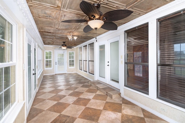 2992 County Road 100, Brady, TX 76825 - unfurnished sunroom with a ceiling fan and french doors