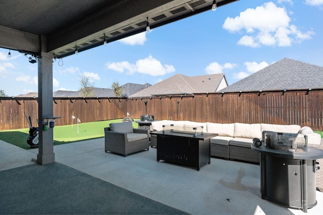 1517 Sweetwater Way, Celina, TX 75009 - fenced backyard featuring an outdoor living space, a putting area, and a patio area