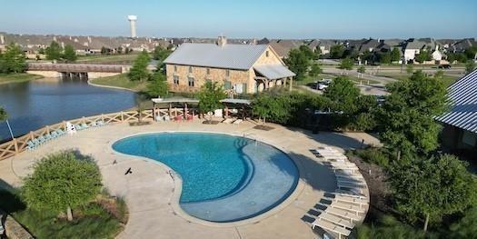 1517 Sweetwater Way, Celina, TX 75009 - community pool featuring a water view and a patio area
