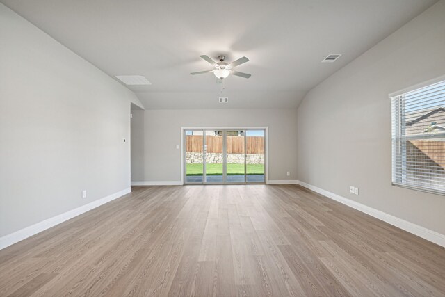 516 Stagg St, Mckinney, TX 75069 - empty room with ceiling fan, light wood-type flooring, baseboards, and lofted ceiling