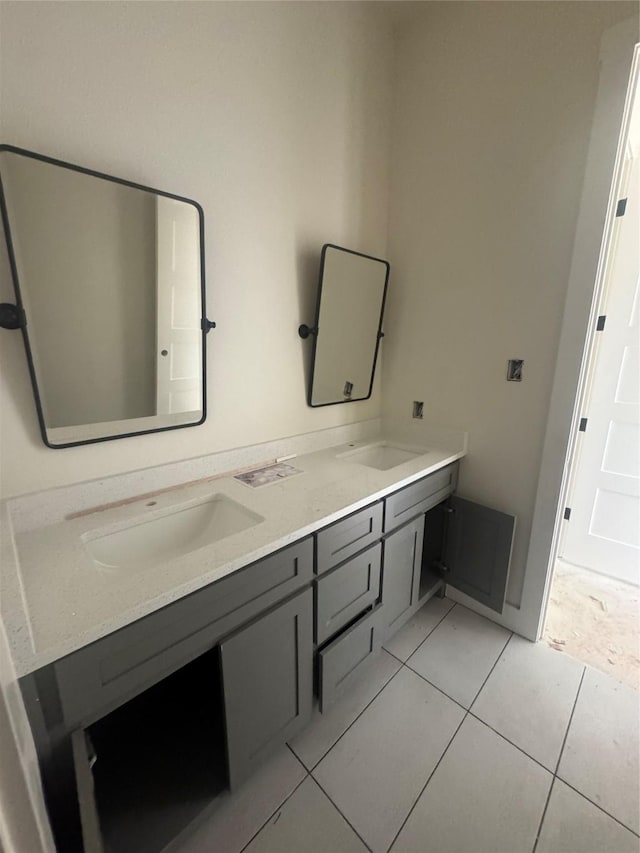 1037 Woodland Rd, Weatherford, TX 76088 - full bathroom featuring double vanity and tile patterned flooring