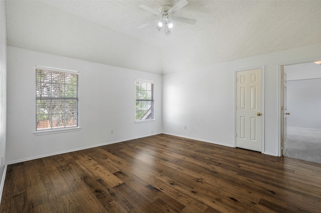 2221 Bennington Ave, Flower Mound, TX 75028 - unfurnished room featuring lofted ceiling, ceiling fan, dark wood finished floors, and a textured ceiling