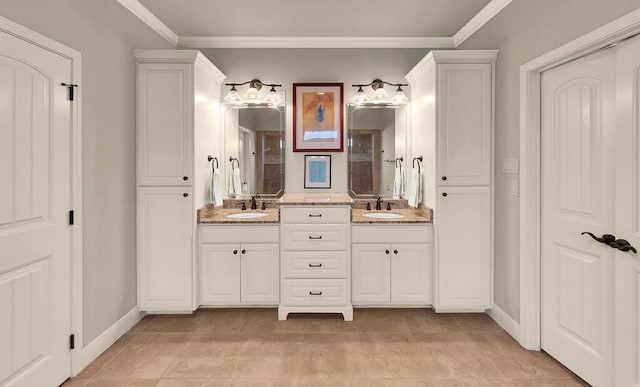 103 Saintsbury Cir, Waco, TX 76712 - full bathroom featuring double vanity, ornamental molding, tile patterned floors, and baseboards