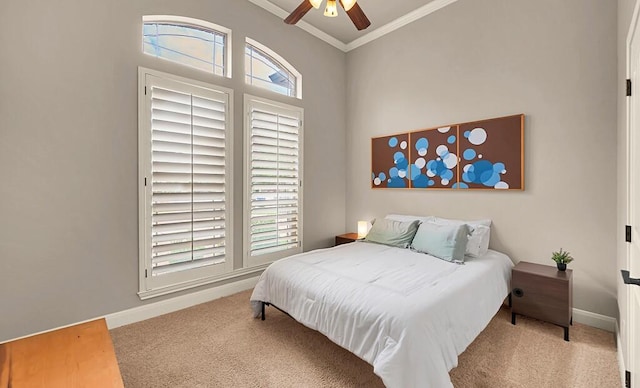 103 Saintsbury Cir, Waco, TX 76712 - bedroom with ornamental molding, carpet flooring, baseboards, and a ceiling fan