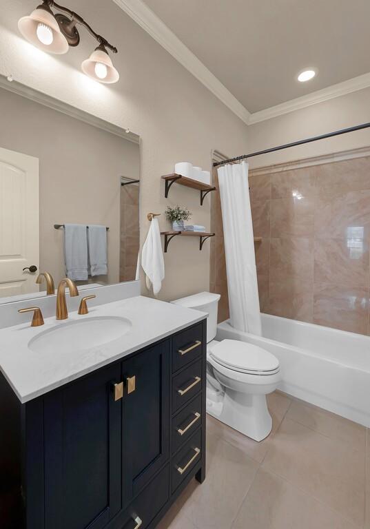 103 Saintsbury Cir, Waco, TX 76712 - full bathroom featuring ornamental molding, vanity, toilet, tile patterned floors, and shower / tub combo