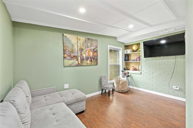 2507 16th St, Brownwood, TX 76801 - living area with wood finished floors, baseboards, beam ceiling, and recessed lighting