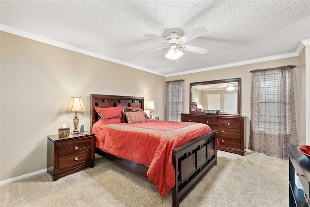 2507 16th St, Brownwood, TX 76801 - bedroom with light colored carpet, crown molding, a textured ceiling, a ceiling fan, and baseboards