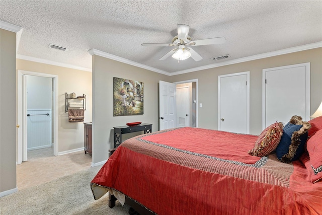 2507 16th St, Brownwood, TX 76801 - carpeted bedroom featuring baseboards, ornamental molding, ceiling fan, and ensuite bathroom