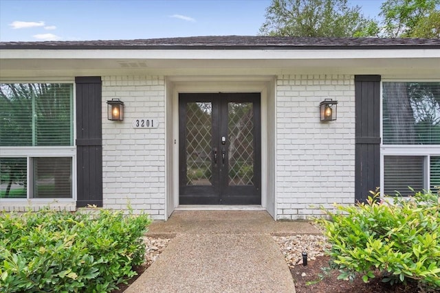 3201 Carroll Dr, Waco, TX 76708 - view of exterior entry featuring brick siding and french doors