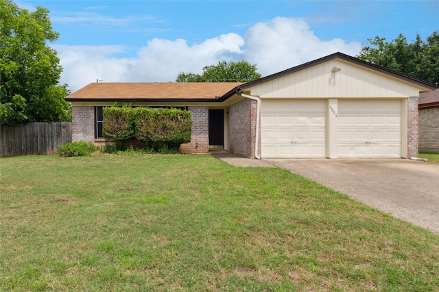6003 Springwood Dr, Arlington, TX 76001 - ranch-style home featuring brick siding, an attached garage, and driveway