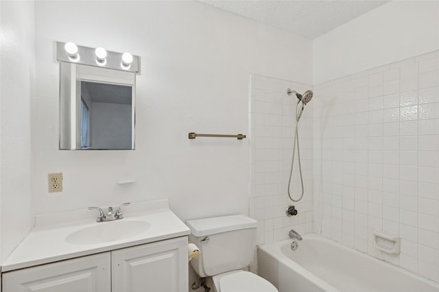 6003 Springwood Dr, Arlington, TX 76001 - bathroom featuring toilet, vanity, shower / bathtub combination, and a textured ceiling