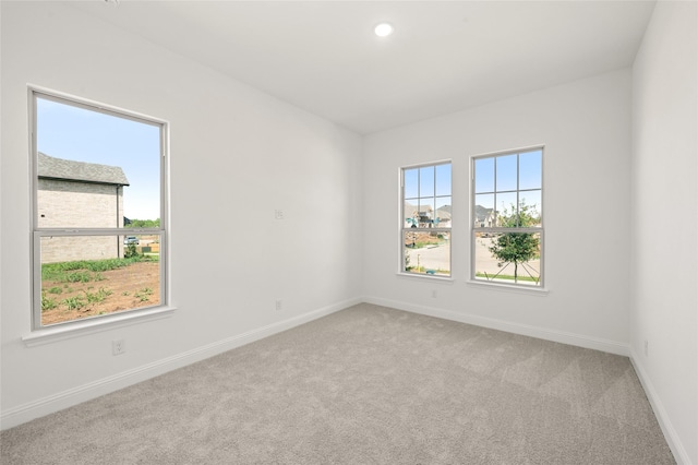 2397 Rams Horn Dr, Waxahachie, TX 75165 - unfurnished room with plenty of natural light, light colored carpet, baseboards, and recessed lighting