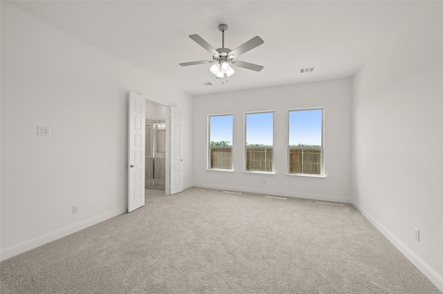 2397 Rams Horn Dr, Waxahachie, TX 75165 - spare room featuring light colored carpet, ceiling fan, and baseboards
