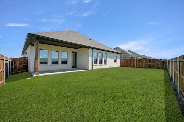 2397 Rams Horn Dr, Waxahachie, TX 75165 - rear view of property featuring brick siding and a shingled roof