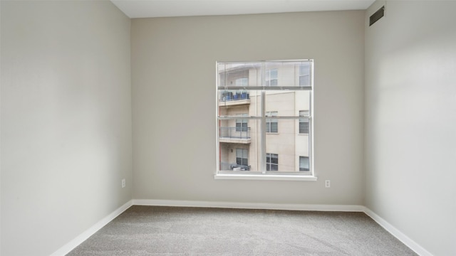2950 Mckinney Ave Unit 316, Dallas, TX 75204 - carpeted spare room with baseboards