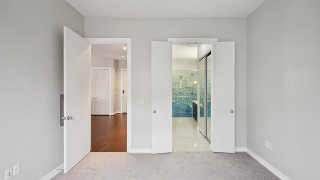 2950 Mckinney Ave Unit 316, Dallas, TX 75204 - unfurnished bedroom with carpet floors and baseboards