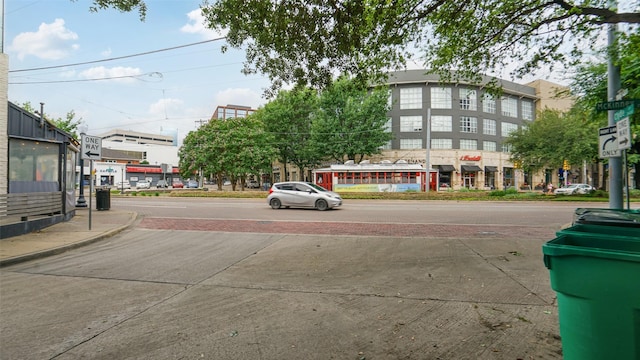 2950 Mckinney Ave Unit 316, Dallas, TX 75204 - view of road featuring curbs, sidewalks, street lighting, and traffic signs