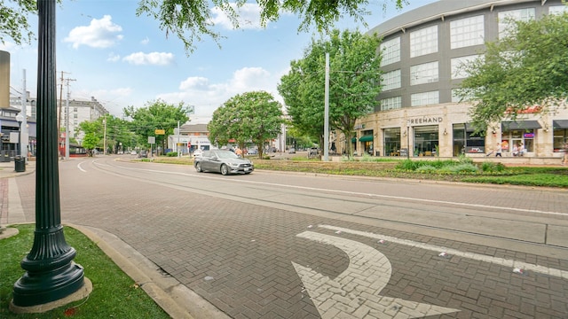 2950 Mckinney Ave Unit 316, Dallas, TX 75204 - view of decorative street featuring curbs, sidewalks, and street lights