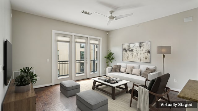 2950 Mckinney Ave Unit 316, Dallas, TX 75204 - living area with wood finished floors, ceiling fan, and baseboards