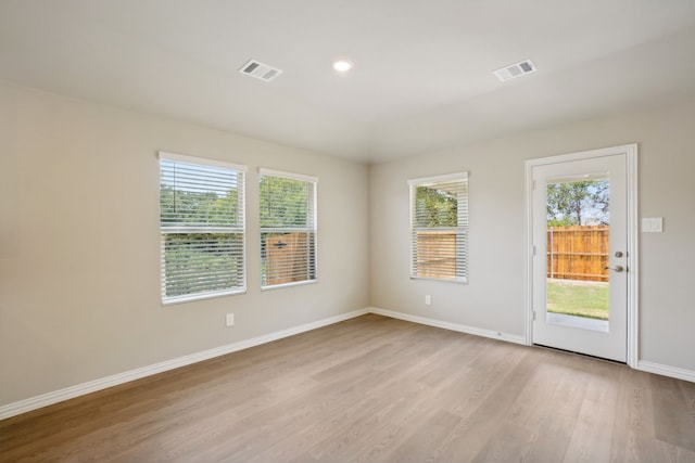 414 Stagg St, Mckinney, TX 75069 - spare room with light wood finished floors, baseboards, and recessed lighting