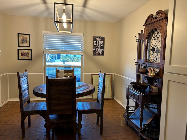 7750 Dentcrest Dr, Dallas, TX 75254 - dining space with brick flooring and baseboards
