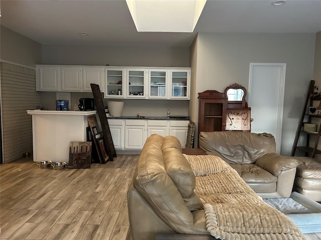 7750 Dentcrest Dr, Dallas, TX 75254 - living room featuring light wood-style floors
