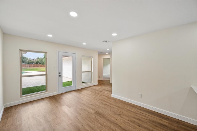 902 Mission Dr, Southlake, TX 76092 - spare room featuring wood finished floors, baseboards, and recessed lighting