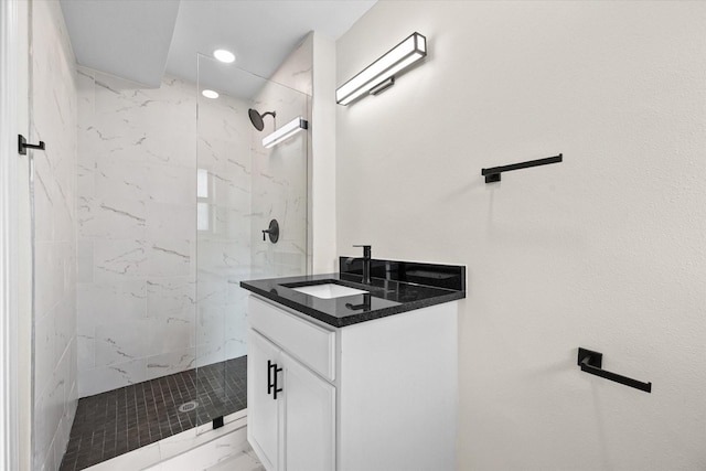 902 Mission Dr, Southlake, TX 76092 - bathroom featuring a marble finish shower, marble finish flooring, and vanity