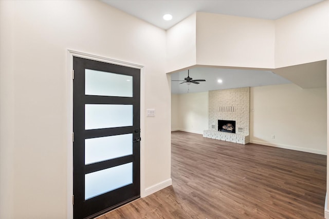 902 Mission Dr, Southlake, TX 76092 - entrance foyer featuring wood finished floors, a ceiling fan, recessed lighting, baseboards, and a brick fireplace