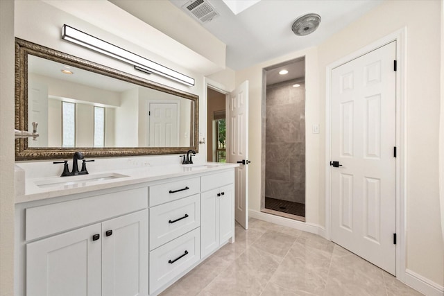 902 Mission Dr, Southlake, TX 76092 - full bathroom with plenty of natural light, a stall shower, double vanity, recessed lighting, and marble finish flooring